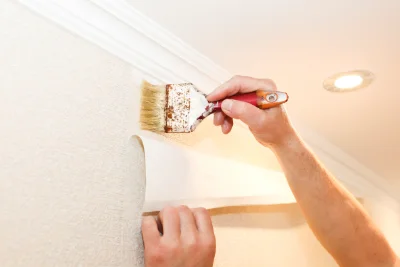 Pose de papier peint à la Porcherie — revêtements muraux et toiles de verre